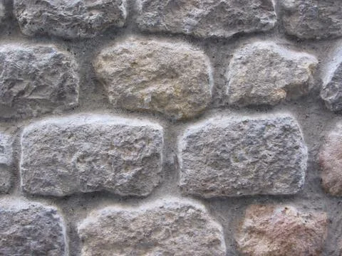 Gray stone wall background Stock Photos