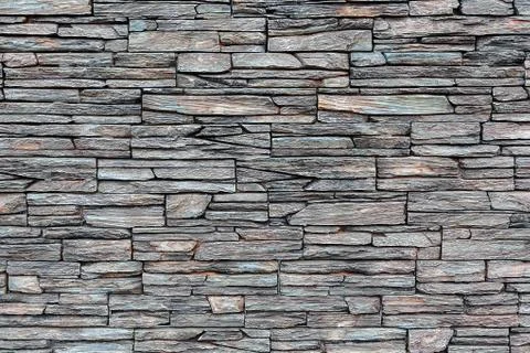 Gray stone wall as background Stock Photos