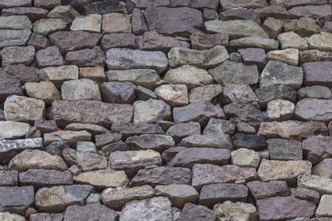 Gray stone wall. Stock Photos
