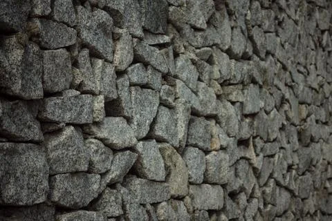 Gray stone wall. Stock Photos