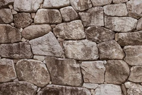 Gray stone wall. Stock Photos
