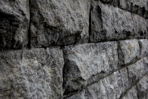 Gray stone wall. Textured background closeup. Foto stock