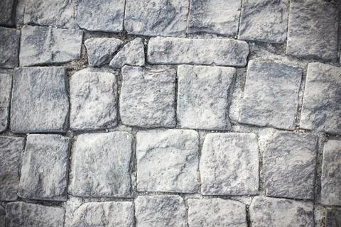 Gray stones pavement bricks background Stock Photos