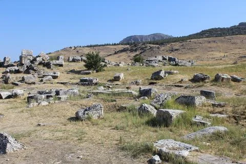 Gray stones of regular shape, perhaps the remains of ancient graves Foto stock