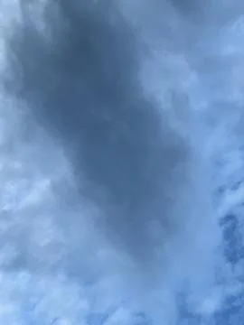 Gray Storm Cloud Mass Moving Across Sky Stock Photos