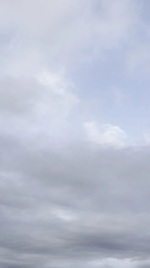 Gray Storm Clouds With Small Blue Sky Opening Video stock 344807530