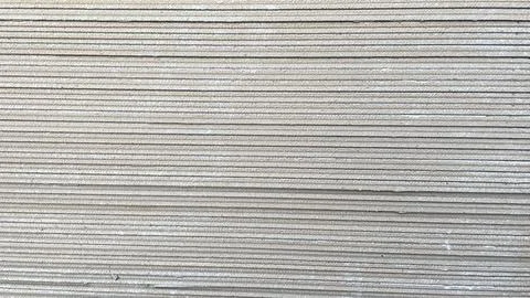 Gray straight line pattern texture of thin pile of material Stock Photos