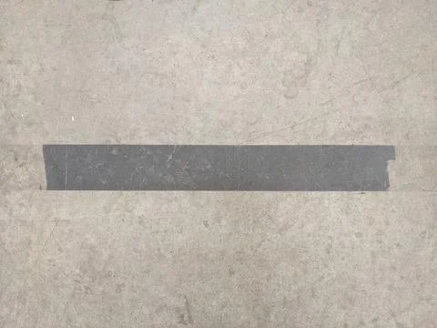 Gray stripe on a gray background. Texture. Seamless background. Stock Photos