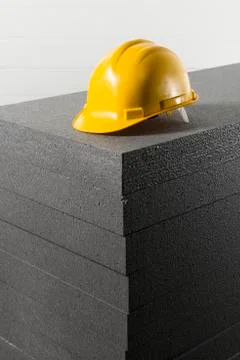 Gray styrofoam and helmets Stock Photos