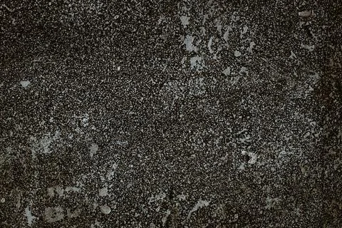 Gray surface with fine texture and white dots. Abstract neutral background for Stock-Fotos