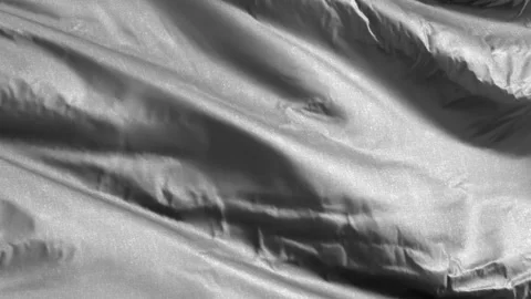 Gray textile fabric waving on the wind background. Solid Color Tone. Full fil Stock Footage 197429143