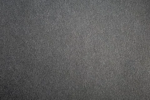 Gray textile surface closeup detailed woven fibers uniform carpet texture Stock Photos