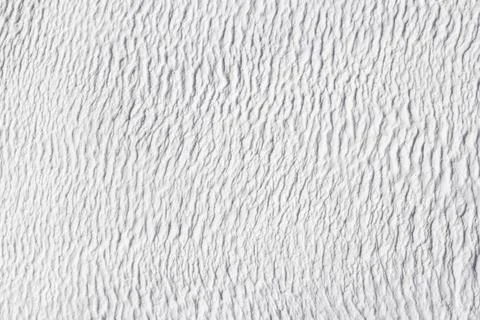Gray texture of abstract background of Pamukkale calcium travertine . Stock Photos