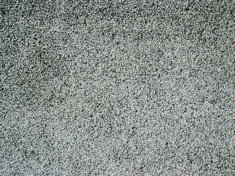 Gray texture of granular stone pavement. Concrete surface with a rough solid Stock Illustration