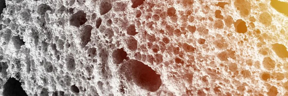 Gray texture of white bread close up background. backdrop of rough textured s Stock Photos