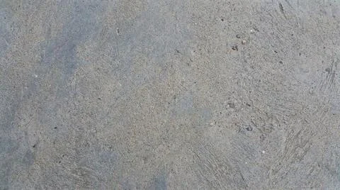 Gray textured background with blue spots. Fotos Stock