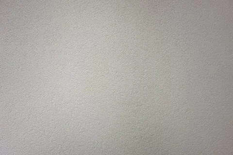 Gray textured background. Small grained grunge backdrop wall. Design pattern  Stock-Fotos