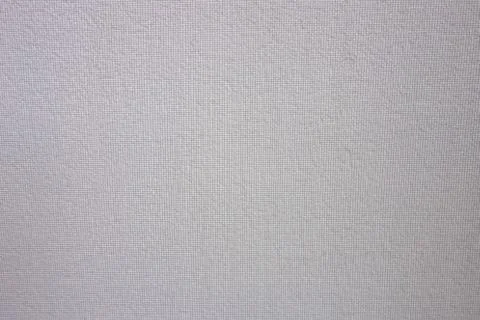 Gray textured background. Small meshed grunge backdrop wall. Design pattern t Photos