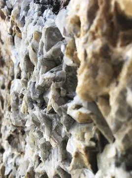 Gray textured rock surface Stock Photos