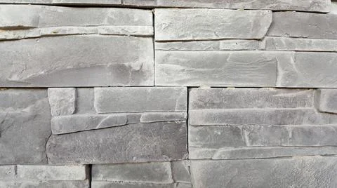 Gray textured stone wall. Stock Photos