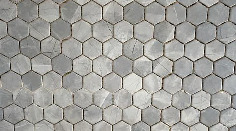 Gray Tiled Wall. Mosaic tile installation. The texture of the mosaic tiles in Foto stock