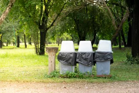 Gray trash in public areas. To keep clean in the area. Stock Photos