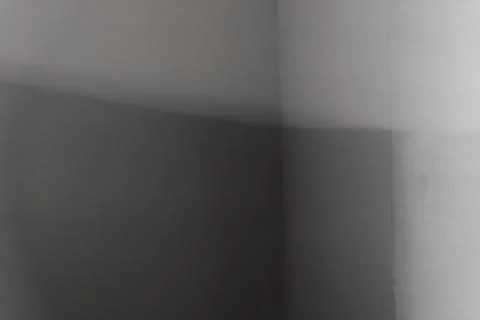 The gray wall with edge that loses itself in the room Stock Photos