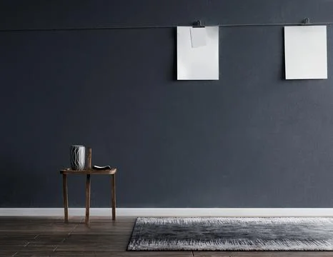 Gray wall in an empty room with a photo frame, wooden floor with carpet. Illustrazione stock