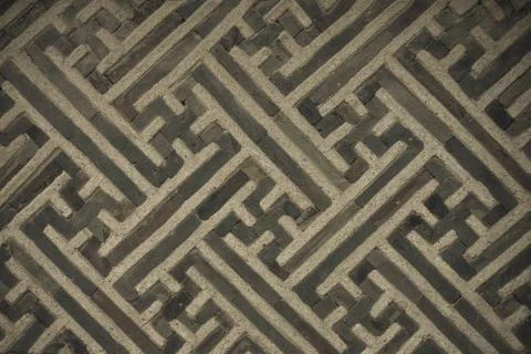 Gray wall with an ornament. Stock Photos