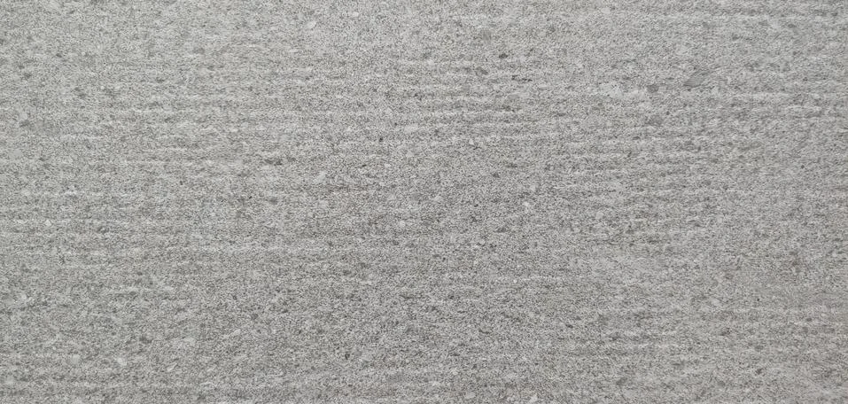 A gray wall with small horizontal lines visible background Stock Photos