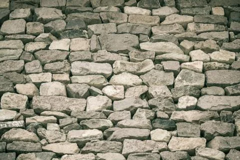 Gray wall of stone. Stock Photos