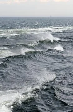 Gray waves of St. Lawrence river Stock Photos