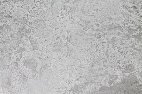 Gray-white background with a gray accent on the edges. The texture of decorative Stock Photos