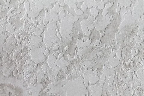 Gray-white background. The texture of decorative plaster Stock Photos