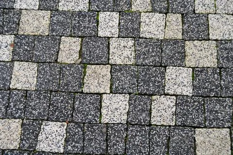 Gray white colored square and rectangle paving stone, tiled stone texture Stock Photos