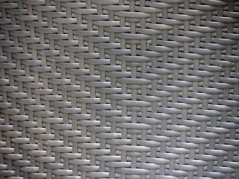 A Gray Wicker Rattan Texture Close-Up On Outdoor Patio Furniture Chair Surfac Stock Photos