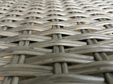 Gray wicker texture closeup. Background for website design, screen, banner. Stock Photos