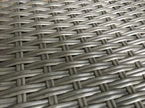 Gray wicker texture closeup. Background for website design, screen, banner. Stock Photos