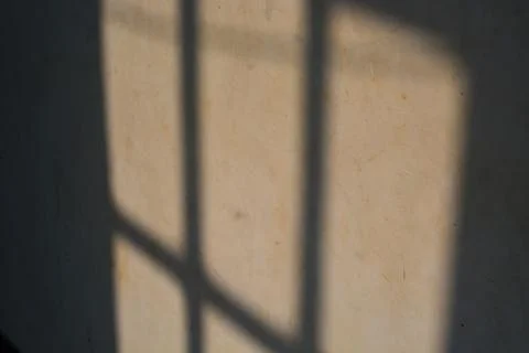 Gray window shadow and light blur abstract background on white wall, shadow.. Stock Photos