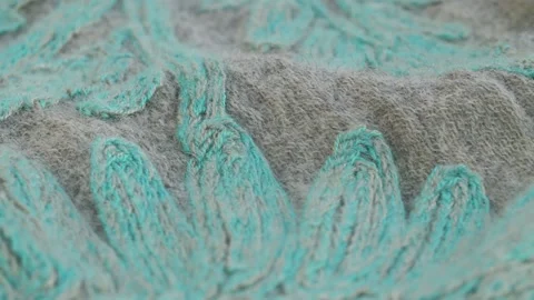 Gray woolen fabric with embroidery Stock Footage 137749596