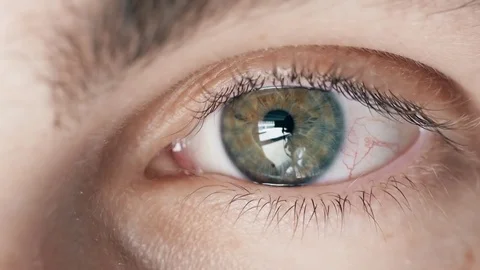 Gray with yellow human eye of young boy looking at camera, close up. 스톡 동영상 78831605