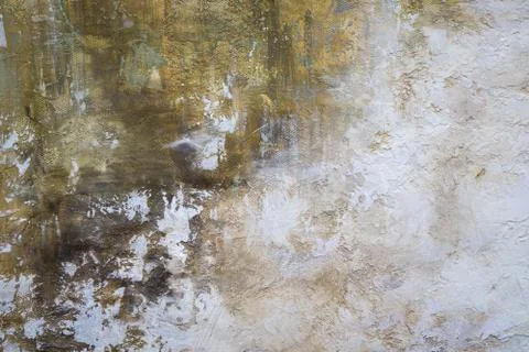 Gray-yellow old wall with layers of paint. Concrete texture. Oil paint on canvas Stock Photos