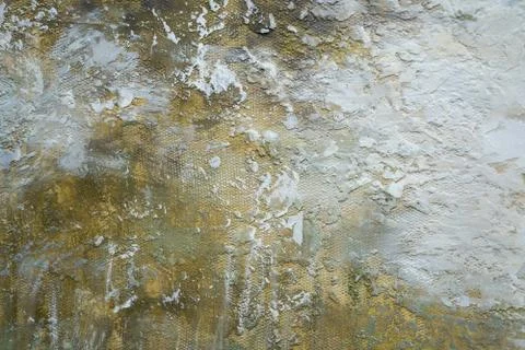 Gray-yellow old wall with layers of paint. Concrete texture. Oil paint on canvas Stock Photos