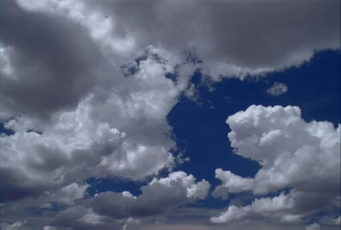 Grayish time-lapse clouds gathering in blue sky Stock Footage 86919378