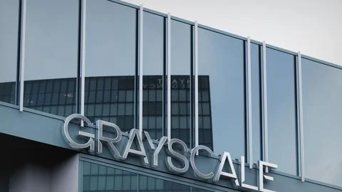 Grayscale Bitcoin Trust Stock data presented on the logo of the office facade Stock Photos