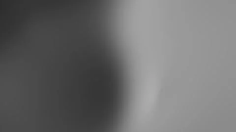 A grayscale gradient background has one tiny red dot. Stock Footage 296180942
