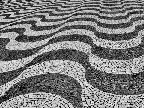 Grayscale shot of an abstract floor pattern design. Stock Photos