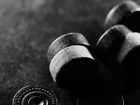 Grayscale studio shot of backgammon pieces Stock Photos