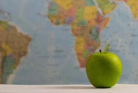 Grean apples around the world. Stock Photos