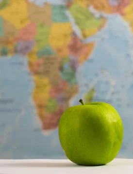 Grean apples around the world. Stock Photos